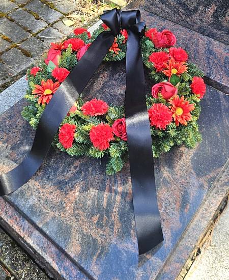 Artificial red wreath Roses and carnations